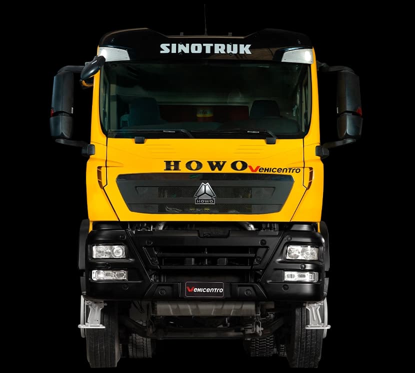 VOLQUETA TX 460 8x4 MT COMPLETA Howo Sinotruk serie TX 460 hp - 1900 rpm HP 2025 imagen frontal